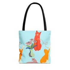 Introducing our one-of-a-kind tote bag featuring a funky and colorful cat design, perfect for teachers, book club members, and cat ladies alike! Carry all the stuff with this unique accessory that combines functionality with personality. This tote bag is not just a great bag, but also a fun and eye-catching gift for anyone who loves cats and wants to add a pop of color to their daily routine. Stand out from the crowd with this vibrant and playful accessory that merges practicality with a touch of whimsy. Ideal for those who appreciate both functionality and creativity, this tote bag is a must-have for anyone looking to showcase their love for cats in a fun and fashionable way. This tote bag design was uniquely created with the EarlyGirlBoutique personal touch. I take inspiration from thing Rectangular Shoulder Bag With Cat Design For Gift, Everyday Rectangular Bag With Cat Print, Cat Print Shoulder Travel Bag, Blue Rectangular Bag With Cat Design, Rectangular Travel Bag With Cat Print, Daily Use Cat Print Rectangular Shoulder Bag, Rectangular Cat Print Travel Bag, Rectangular Cat Print Bag For Everyday Use, Everyday Rectangular Shoulder Bag With Cat Print