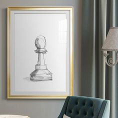 a black and white drawing of a chess piece hangs on the wall next to a blue chair