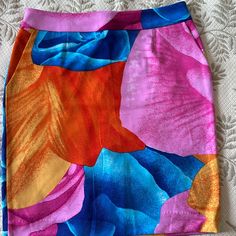 Joyful Colors Skirt Ready For Spring Size 8 With Side Pockets 95% Polyester Back Zipper 21 Inches Long Multicolor Floral Print Party Bottoms, Colorful Vibrant Summer Skirt, Vibrant Colorful Summer Skirt, Vibrant Multicolor Party Bottoms, Multicolor Relaxed Pencil Skirt, Chic Multicolor Floral Print Mini Skirt, Casual Multicolor Skirt With Vibrant Print, Summer Multicolor Vibrant Print Skirt, Vibrant Fitted Summer Skirt