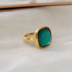 D E T A I L S - Material: 925 Sterling silverStone: Green OnyxThe fit: True to US ring size Finish: Smooth and Gold Plated to a high shineS H I P P I N G & P R O D U C T I O N - My current production time is 2-6 business days, which means after those days are up, your order ships! I make everything custom to order, by hand, but I promise you it's worth the wait!R U S H - M Y - O R D E R -If you're in a rush to get your pretty new pieces, please send me a message and I'll let you know just ho Green Turquoise Ring As A Gift, Green Turquoise Ring For A Gift, Green Turquoise Ring For Gift, Classic Green Turquoise Ring For Gifts, Classic Adjustable Green Ring, Ring Everyday, Ring Square, Chalcedony Ring, Zierlicher Ring