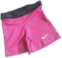 Fitted Pink Athletic Shorts With Moisture-wicking, Pink Elastic Sports Bottoms, Elastic Pink Sports Bottoms, Fitted Pink Athletic Shorts, Pink Stretch Sportswear Shorts, Pink Nike Athletic Shorts, Pink Nike Fitted Shorts, Pink Sportswear Shorts For Training, Fitted Pink Nike Shorts