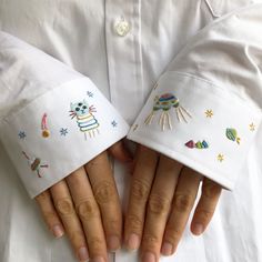 two hands with embroidered white gloves on their palms and the words pdf pattern above them