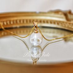 Elegant Skull Shaped Jewelry For Gifts, White Skull Shaped Jewelry Gift, Gold Shell-shaped Pearl Necklace Gift, Pearl Skull Necklace, Pearl Necklace With Shell-shaped Pearl Pendant, Yellow Gold Skull Jewelry For Gift, Shell-shaped Pearl Necklace With Pearl Chain, Elegant Skull-shaped Jewelry For Gifts, Pearl White Shell-shaped Necklace With Pearl Pendant