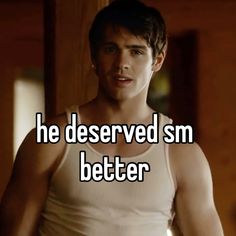 a man in white tank top with text that reads he deserved sm better than him