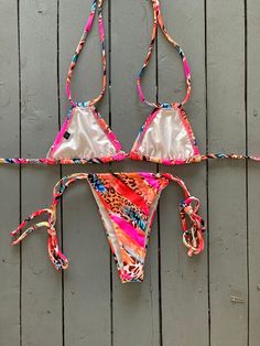 Our super sexy adjustable cinched thong bikini bottom comes in many different colors. This animal print is an absolutely gorgeous fabric that’s very high quality. Can be paired with our matching triangle bikini top or double string triangle bikini top. DM with inquiries @jillesbikinis Adjustable Multicolor T-back Swimwear, Multicolor String Swimwear For Beach, Multicolor T-back Swimwear With Adjustable Straps, Multicolor String Swimwear For Poolside, Pink And Brown, Summer Bikinis, Gorgeous Fabrics, Animal Print, Spaghetti