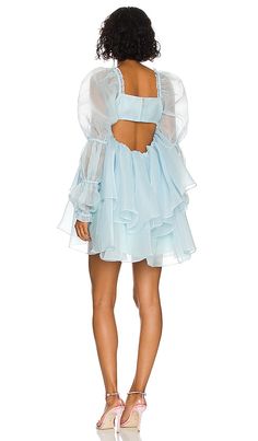 Find SELKIE X The Moonlight Dress In Baby Blue on Editorialist. Selkie x REVOLVE The Moonlight Dress in Baby Blue. - size 5X (also in 6X, XXS) Selkie x REVOLVE The Moonlight Dress in Baby Blue. - size 5X (also in 6X, XXS) 100% polyester. Made in China. Dry clean only. Fully lined. Hidden back zipper closure. Ruched bust. Puff sleeves Lightweight organza fabric with ruffle trim. SLKR-WD78. SKPO1104. Meet Selkie: fanciful, nostalgic and extra romantic. Started by former Wildfox Co-Founder Kimberle Selkie Dress, Whimsical Clothing, Moonlight Dress, Female Friendship, Organza Fabric, Ruffle Trim, Dress Brands, Puff Sleeves, Timeless Pieces