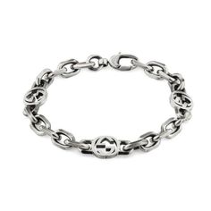 From Gucci, this sterling silver bracelet boasts an aged finish that adds an antique quality to the design of the piece. The iconic Gucci interlocking G design is repeated amongst chunky chain links to create monogram styling. This bracelet is 6.5 inches in length. Made in Italy. Gucci Chain, Silver Link Bracelet, Gucci Jewelry, Silver Chain Bracelet, Couple Bracelets, Metal Chain Link, Bangles Jewelry, Sterling Silver Bracelet, Gucci Men