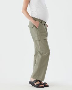 Mid rise elastic waistband Wide leg silhouette Side pockets, back pockets & cargo pockets Inseam length: 78cm On trend and a must have in your maternity wardrobe this season is our Wide Cargo Pant. Available in three colours- Khaki, Black & Beige, these pants are sure to give you cool off duty mum vibes. Designed with a button & fly and our famous elastic waistband that sits at a comfortable midrise through all trimesters and that can continue to be worn without a belly. They have a wide leg sil Utility Full-length Bottoms With Elastic Waistband, Versatile Everyday Pants With Pockets, Versatile Everyday Bottoms With Side Pockets, Casual Relaxed Fit Maternity Pants, Casual Maternity Pants With Relaxed Fit, Versatile Everyday Pants With Side Pockets, Versatile Everyday Cargo Pants With Pockets, High Waist Utility Cargo Pants For Everyday, Versatile Everyday Pants With Cargo Pockets