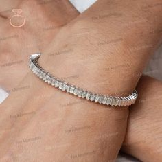 Natural White Baguette Diamond Bangle Handmade 14k White Gold Cuff Bangle Jewellery. Gift For Her Trendy Bangle Bracelet Jewelry Women's Gift New Design  BAMJ-142 GrWt : 12.1gm Gold Wt : 11.84gm Baguette Wt : 1.27ct Baguette Pcs : 24 Size : 45X60 MM ✦ This is the perfect gift for mom, wife, fiancée, girlfriend, valentine, daughter, family or friend. It is a special gift for mother's day, valentine's day, wedding, anniversary, birthday, Christmas, Easter, New Year's and any holiday. ✦ Custom Orders : Since most products are handmade and made by members of my shop , you can ask us any kind of customization. You can choose from 14k Gold, 925 Silver And Diamond. For most of the items. Gemstone can be changed as per your preferences. ✦Thank You for visiting our shop. ❤ Gold Cuff Bangle, White Gold Bangle, Jewellery Wedding, Handmade Bangles, Gold Cuffs, Gold Bangle Bracelet, Gold Bangle, Diamond Bangle, Jewellery Gift