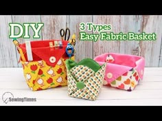 three different types of fabric baskets sitting on top of a white wooden table next to scissors