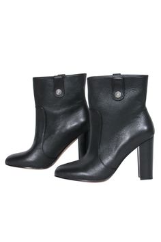 Take your fall style to a whole new level with these booties from Paige! Created with soft pebbled leather and a tall ankle shaft, these heeled beauties are perfect for a night out during those chilly months. Style with leather leggings and a cropped sweater for an edgy look that's sure to heat up the cold! Size 7.5 Pebbled leather upper Silver-toned hardware Ankle high shaft Round toe Tall, chunky heel Leather sole and footbed w/ slight wear Original dustbags included Shaft 3" Heel 4" Workwear Ankle Boots With 4-inch Heel, Workwear Ankle Boots With Heel Tab, Ankle Boots With Heel Tab For Work, Classic Fall Boots With 4-inch Heel, Ankle Heeled Boots For Workwear With 4-inch Heel, Classic Stacked Heel Boots For Fall, Chic Ankle Boot Booties With Reinforced Heel, Classic High Ankle Heeled Boots For Fall, Chic Faux Leather Ankle Moto Boots