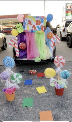 an odd car with candy and candies on the back