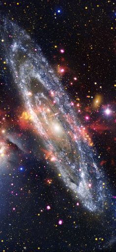 an image of a very large and colorful object in the sky with stars around it