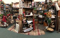 a room filled with lots of different types of items and decorations on display in it