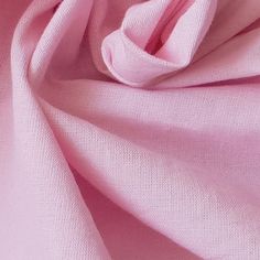 a close up view of a pink fabric