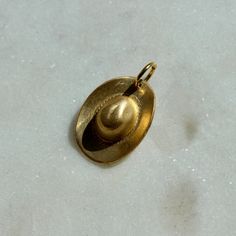 The charm is made of raw brass and comes with a jump ring for threading on your favorite necklace or jewelry making.Size: 14mm x 18mm Cowboy Hat, Threading, Raw Brass, Jump Rings, Ring Necklace, Charm Jewelry, Cowboy Hats, Charm Necklace, Cowboy