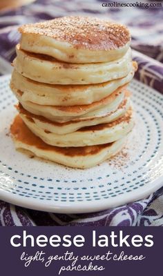 a stack of pancakes with powdered sugar on top and the words, cheese lattes