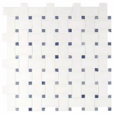 a white and blue tile wall with squares