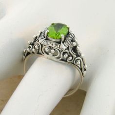 Vintage Estate 1.50 Carat Natural Peridot Solitaire Filigree Ring. Heart Designs. 925 Solid Sterling Silver. The Top Of The Ring Measures Nearly 1/2 Inch In Length. Set With One High Quality 8x6 mm, Approx. 1.50 Ct. Natural Peridot Stone. Stamped 925. Excellent Condition/Like New. Heart Designs, Ring Heart, Peridot Stone, Filigree Ring, Heart Design, Solitaire Ring, Cuff Bracelets, Silver Rings, Sterling Silver