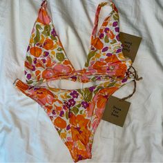 Brand New With Tags Never Worn. Luka Bottom And Paloma Top In Print Bloom. Both Are Size Large. Originally $180+ For Both. Fox Swimsuits, Orange Floral Print Swimwear, Orange V-neck Swimwear For The Pool, Pink V-neck Swimwear With Floral Print, Stone Fox Swim, Stone Fox, Bohemian V-neck Floral Print Swimwear, Paloma, Womens Swim