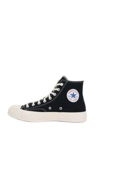 Comme des Garçons Play x Converse's high-top sneakers crafted in black canvas with contrasting toe cap in shiny rubber. Featuring lace-up closure, a round-toe silhouette, fabric lining and rubber sole with logo patch at heel. The design is completed by Filip Pagowski's heart print on side.Unisex Fit: Sizes may vary. For accurate sizing, please contact our customer support team.Gender: UnisexMaterial: 100% COTTON, 100% RUBBERColor: BlackMade in: VNProduct ID: P1K1121BLACK*Import tax/duty will be Converse Comme Des Garcons Low, Converse Cdg One Star, Grey Comme Des Garcons Converse, Converse Play Comme Des Garcons, Converse X Comme Des Garcons, Comme Des Garcons Play Converse, Play X Converse, Converse Comme Des Garcons, Play Converse