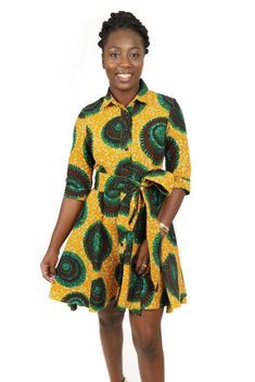 Floral Print Ankara Fabric Dress, Floral Print Ankara Dresses For Spring, Spring Floral Print Ankara Dresses, Yellow Fitted Ankara Fabric Dress, Spring Knee-length Ankara Dress, Spring Ankara Fabric Mini Dress, Spring Ankara Fabric Fitted Mini Dress, Long Sleeve Ankara Fabric Spring Dress, Spring Fitted Ankara Fabric Mini Dress