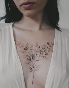 a woman with flowers on her chest