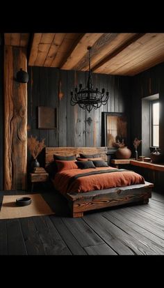 a bedroom with wooden walls and flooring has a chandelier