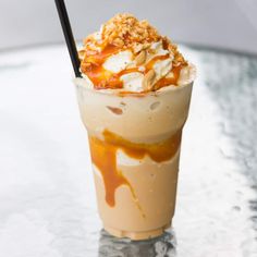 an ice cream sundae with caramel and whipped cream