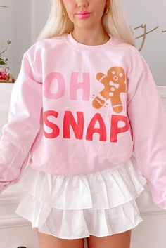 Get ready to spice up your wardrobe with our Oh Snap Gingerbread Man Graphic Sweatshirt! Featuring a quirky design and playful word play, this sweatshirt is perfect for anyone who doesn't take themselves too seriously. Stay cozy and stylish while spreading some holiday cheer! Model Info: Models are 5'7", Size 2, wearing smalls Material: :70% Polyester + 30% Cotton Size Chart (INCH) Sizes Bust Shoulder Sleeve_Length Length Hem_Width Relax Relax Relax Front Relax S 40.6 21.9 20.3 25.4 38.2 M 42.5 Oh Snap Gingerbread Man, Chic Christmas Outfit, Manger Christmas, Holiday Crewneck, Sassy Shortcake, Gingerbread Man Christmas, Christmas Pullover, Sequined Sweatshirt, Oh Snap