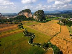 an aerial view of the countryside and mountains