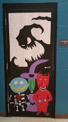 a door decorated with paper cut outs and various cartoon characters, including an evil man