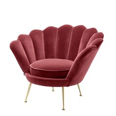 a red chair with gold legs and a round cushion on it's back, in front of a white background