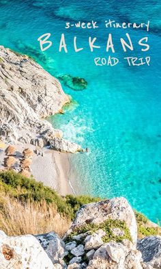 an aerial view of the beach and water from above with text overlay that reads itinerary balkans road trip