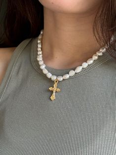 🌟 Crusader Pearl Cross Necklace | Elegant Pearl Jewelry Discover the allure of our Crusader-inspired pearl cross necklace: Authentic pearls exuding elegance Detailed with a gold plated brass cross and clasp Adjustable length: 38-45 cm for a perfect fit Pearls exhibit varying sizes and shapes, enhancing uniqueness 🌿 Care Instructions: Delicate and elegant, these products require gentle handling to prevent breakage. Make sure it is properly cleaned, polished, and stored away from water, chlorine, or chemicals such as perfumes or lotions. 🔨 Handcrafted Excellence: Each piece is meticulously handcrafted and made to order, ensuring uniqueness and minor differences that enhance its charm. 📦 Shipping Details: Enjoy worldwide shipping! Each order is carefully hand-packed, promising a delightfu Gold Jewelry With Pearl Charm Cross Pendant, Elegant Gold Cross Necklace With Pearl Pendant, Gold Cross Necklace With Pearl Pendant, Gold Cross Necklace With Pearl Chain, Gold Cross Pendant Jewelry With Pearl Charm, Elegant Pearl Crucifix Necklace, Elegant Crucifix Pearl Necklace, Gold Necklaces With Pearl Chain And Cross Pendant, Gold Necklace With Pearl Chain And Cross Pendant