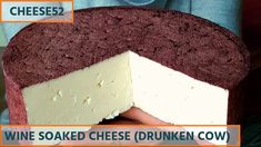 a person holding a piece of cheese in front of their face with the words wine soaked cheese drunk cow