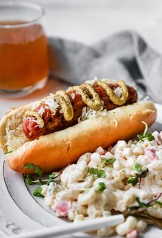 a hot dog and potato salad on a plate