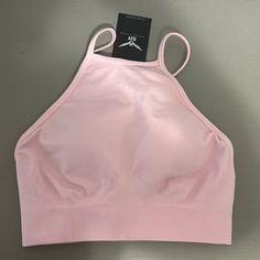 High Neck, Baby Pink Sports Bra Never Worn, Tags Still On! Spring Crop Top With Built-in Bra For Gym, Pink High Stretch Crop Top With Built-in Bra, Pink Crop Top With Built-in Bra And High Stretch, Pink Spring Activewear With Built-in Bra, Spring Sports Crop Top With Built-in Bra, Casual Training Crop Top With Built-in Bra, Spring Seamless Racerback Sports Bra, Casual Seamless Crop Top For Training, Summer Racerback Sports Bra For Loungewear