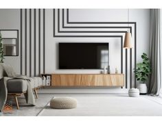 a modern living room with black and white striped walls