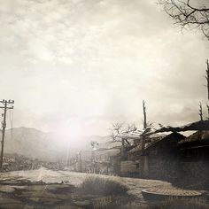 an old photo of a street with houses and telephone poles in the distance on a cloudy day