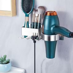 PRICES MAY VARY. SUS304 STAINLESS STEEL: Made of thickened stainless steel SUS304, which prevent rust or corrode and is waterproof and easy to clean. The modern and minimalist look of the hair dryer holder brings modern elegance to your bathroom MULTIFUNCTIONAL STORAGE: Our wall mounted hair dryer holder can not only store hair dryer, but also combs, razor, skincare, and the hooks can hang hair ties, hair accessories, etc. The plug hooks make it easier to organise cable plugs and cabling FITS 99 Blow Dryer Storage, Hair Brush Holder, Hairdryer Holder, Blow Dryer Holder, Wall Mounted Hair Dryer, Dryer Stand, Hair Tool Organizer, Dyson Hair Dryer, Tidy Bathroom