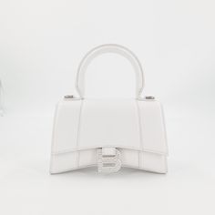 Stunning Bag. Brand New. 100% Authentic. White Xs Balenciaga Bag. With Beautiful Crystals On Buckle. Questions? Leave A Comment Below Balenciaga Hourglass Bag, Balenciaga Top, White Balenciaga, Cristóbal Balenciaga, Balenciaga Handbags, Balenciaga Bag, Work Bags, Mini Purse, Balenciaga City Bag