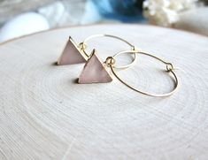 "Gorgeous and alluring in beautiful pale shades of rosy pink, these 14k gold plated rose quartz triangle hoops are sure to get noticed. ★Hoops- High Quality Gold Fill Hoops ★Stone-Genuine Rose Quartz, electroplated in 14k gold ★Dimensions- Hoops are 1\" in diameter. Triangles are 10mm per side ★We want you to love your new jewelry and gladly accept returns. ★Arrives ready for gifting (example in last photo) and usually ships same day or next day. Check shop announcement for occasional delays. Ea Modern Pink Small Hoop Earrings, Modern Pink Small Hoop Jewelry, Pink Triangular Jewelry For Gifts, Minimalist Pink Hoop Earrings For Pierced Ears, Pink Triangle Jewelry For Gifts, Pink Triangle Jewelry For Gift, Pink Minimalist Hoop Earrings For Gift, Pink Minimalist Hoop Earrings Gift, Pink Minimalist Hoop Earrings