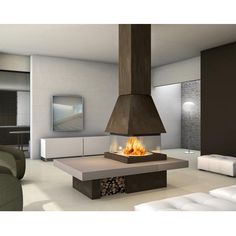 a living room with a fire place in the center and couches to the side