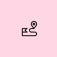 a black and white logo on a pink background with the word'location'in it