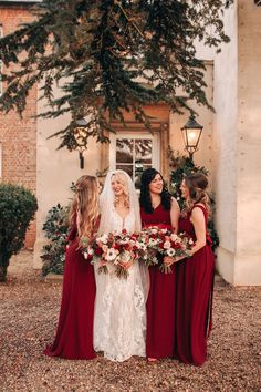 Bridal party wearing festive red bridesmaid dresses with the bride holding red rose bouquets Red Bridesmaid Dresses Winter, Christmas Wedding Bridesmaids Dresses, Christmas Wedding Bridesmaids, Christmas Bridesmaid Dresses, Red Bridal Party, Bridesmaid Dresses Winter Wedding, Bridesmaid Dresses Winter, Wedding With Bridesmaids, Christmas Wedding Dresses