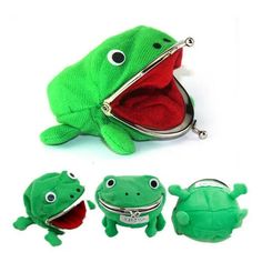 a green frog purse with two red eyes and one green frog keychain attached to it