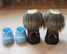 three pairs of shoes with fur on them