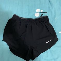 Nike Black Running Shorts Brand New With Tags Size Xsmall Retails $40 Nike Black Stretch Bottoms, Black Stretch Nike Bottoms, Nike Black Athletic Shorts With Built-in Shorts, Nike Black Bottoms With Built-in Shorts, Nike Black Athletic Shorts For Workout, Casual Black Nike Shorts, Nike Black Workout Shorts, Nike Black Gym Shorts, Black Running Shorts