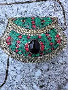 Unique Vintage Handmade Luxury Mosaic Metal Clutch Purse Natural Stones Handbag Sholder Bag Brass Chain Ethnic Perfect Condition Handmade mosaic clutch purse with an antique ethnic tribal detailing with a subtle pop of green and blue stonework.  The front and back of the bag have different detailing so you can actually wear it showing off the detailing of your choice.  This luxury bag comes with a long brass chain so it can be worn as a shoulder bag, but you can also tuck the chain inside  and i Bohemian Beaded Clutch For Festivals, Bohemian Beaded Clutch Shoulder Bag, Handmade Bohemian Gold Clutch, Bohemian Handmade Gold Clutch, Bohemian Clutch Bag As Fashion Accessory, Bohemian Rectangular Shoulder Bag For Party, Bohemian Clutch Shoulder Bag For Party, Bohemian Gold Clutch For Festivals, Handmade Gold Shoulder Bag For Festival